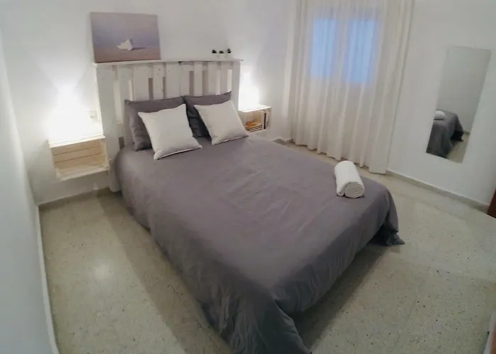 Platja L'arquitecte * Амполья